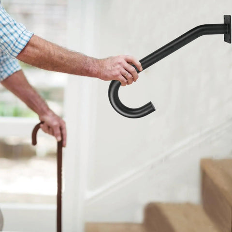 Close-up of Tough As Nails Wall Mount Hand Rails for 1 to 3 Steps Heavy Duty Grade Steel Safety Grab Bar supporting a user.