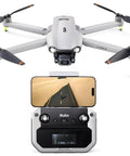 F11PRO 2 Drone with 6K Camera and 3 Axis Gimbal Stabilizer, remote control, phone displaying desert landscape video feed.