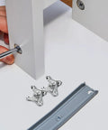 Installing Butterfly Corner Brace Brackets 12 Pack Zinc Alloy Silver Shelf Brackets for Cabinets and Beds on white furniture