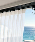 15Ft Retractable Curtain Track Kit With Hooks, Ceiling And Wall Mount, Heavy Duty Telescoping Main Rail For Room Divider, Wardrobe, RV, Hospital, Living Room And Bathroom, Black installed with sheer curtains