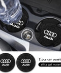 Audi Slick Silicone Cup Holder Coaster Set With Crystal Rhinestones for car interior, shown in cup holders.