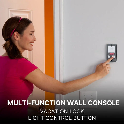 Woman using Series II Wall Console for Garage Door Opener With Sure Lock Vacation Lock for Extra Security