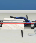 Built Like A Tank 24 Inch Manual Tile Cutter For Porcelain And Ceramic Tiles Featuring Tungsten Alloy Wheel Dual Steel Rails Infrared Laser Alignment And Precision Ruler Bar on workspace with laser guide.