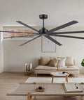 Badass 84 Inch Industrial Ceiling Fan With Reversible DC Motor And Eight Robust Blades Delivers Six Speed Remote Control Hella Quiet Airflow For Massive Garages And Shops In Matte Black in a modern living space.