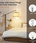 Arc Floor Lamp With Cantilever Arm For Couch And Reading Nook, Adjustable Height, Natural Linen Drum Shade next to bed