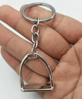 Elegant Stirrups and Snaffle Bit Key Rings D Shaped Keychain made from sturdy alloy in a hand for equestrians and horse lovers.