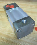 Rexroth Bosch TM82100003014 hydraulic cylinder with 2 in bore and 1-1/2 in stroke, metal body, close-up view on wooden surface
