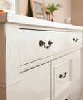 White dresser with Antique Drop Bail Drawer Pulls Set Of Four In Bronzed Finish, Shabby Chic Vintage Cabinet Handles installed.