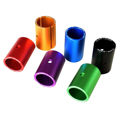 Colorful bike handlebar shims, anodized aluminum, 25.4 to 31.8 mm, shown in red, orange, blue, purple, green, black.
