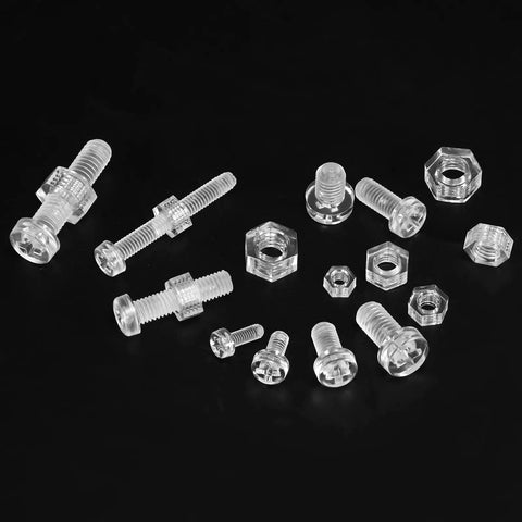 Hella Tough Clear Acrylic Screws And Hex Nuts Kit M6 X 15mm arranged on a dark background, showcasing various sizes and shapes.