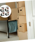 Run Like A Dream Heavy Duty Swivel Casters Set Of Four With Grab And Go Locking Brakes and Flat Base Mounts beside stacked boxes.