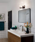 Bathroom with Fourteen And A Half Inch Two Light Vanity Light With Satin Etched Glass In Brushed Nickel over mirror.