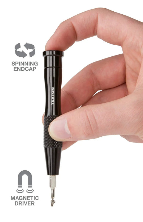 Hand holding magnetic driver from Everybit Tech Rescue Kit 46-Piece Electronics Toolkit With Precision Bits For Tight Spaces.