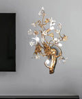 All Copper Postmodern Wall Lamp Featuring Sparkling Crystal Kapok Accent For Bedroom Or Hallway mounted beside a TV.