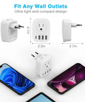 Go-To 6 In 1 Europe Travel Plug Adapter With 2 US Outlets, 3 USB Ports And USB-C beside smartphones