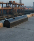 Rubber Semi-Circular Dock Guard and Extruded Rub Rail for Docks, Outer Wheel Docks, and Port Protection installed on a concrete dock