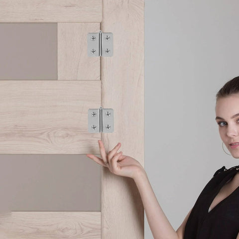 Heavy Duty Stainless Steel Glass Door Hinges 2 Pack Adjustable Cabinet Hinges For Display Cases And Wine Cabinets No Drill Double Sided Interior Door Hardware Smooth Quiet Operation installed on a wooden door with a person pointing at them.