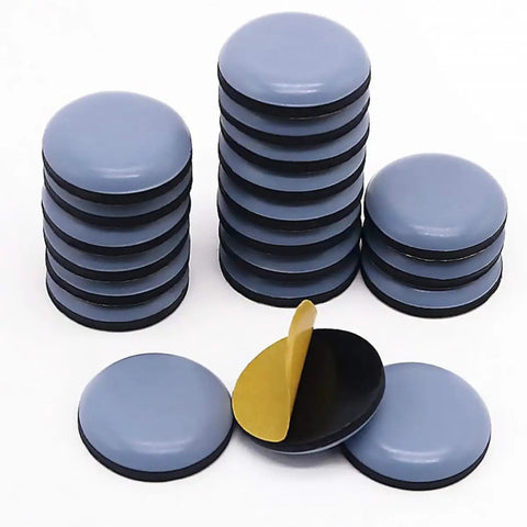 Stacks of dark grey 8 Pack Furniture Glide Pads For Chairs And Tables Non Skid PTFE Rubber Protectors Self Adhesive Floor Protectors