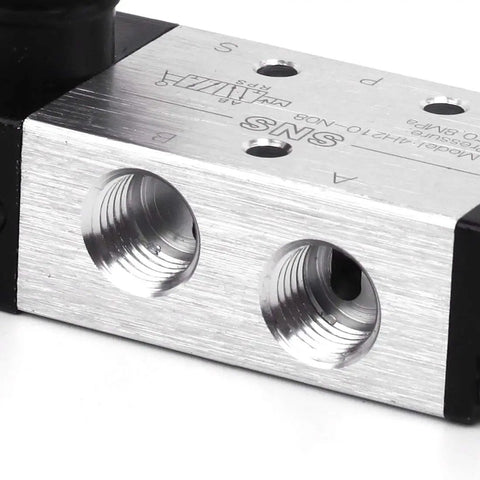 Close-up of 5 Way 2 Position Hand Lever Pneumatic Valve With One Quarter Inch NPT Inlet And Outlet Ports, aluminum body detail.