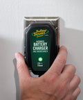 12V Smart Battery Charger And Maintainer For Powersports Riders Straight Up Restoration Of Motorcycles Atvs And Utv Batteries plugged into wall outlet.