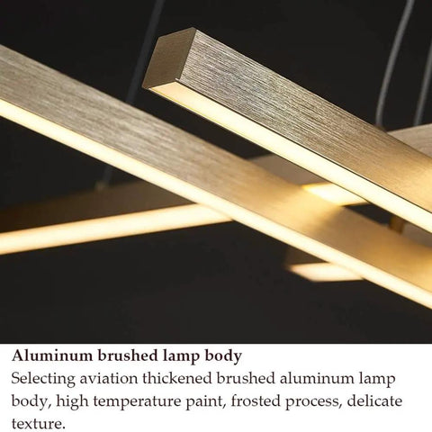 Geometric Linear LED Pendant Light Featuring Sleek Gold Finish Dimmable 3 Color Options Abstract Hanging Design showing aluminum brushed lamp body close-up.