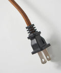 Power cord for Eden Tripod Floor Lamp Dimmable LED With Solid Wood Legs, featuring brown braided design and standard plug.