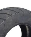 Close-up of 13x5.00-6 tubeless pneumatic go kart tire showing deep tread grip and durable rubber for front or rear wheels.