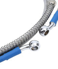 Close-up of Braided Hydraulic Brake Hose Universal 47.2 Inch 120 cm With 10mm M10 Ends showing metal braiding and blue fittings.