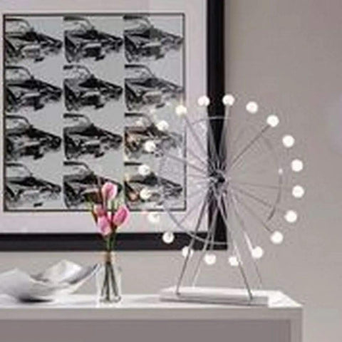 Coney Large LED Ferris Wheel Desk Lamp with chrome finish on white table, 5.25 inch, modern transitional table lamp with bronze accents