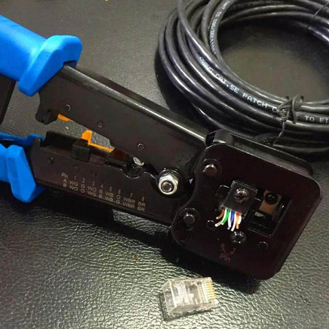 Pro Grade Ethernet Crimp Tool For Pass Through And Standard Ends Heavy Duty Crimper with cable and connector on black surface