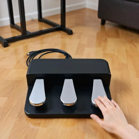 Hand touching Three Pedal Unit For Digital Pianos With Sustain Soft And Sostenuto Pedals, A Real Upgrade For Your Setup, Feels Like The Real Deal, Compatible With P125 P225 And P525, Easy Mount And Solid Build For Home Practice Or Gigs on wood floor
