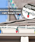 Christmas Light Clips For Fascia Boards Fits One To One And Five Eighths Inch Thickness Roof Gutter Fence Hooks White 100 Pieces Easy Install Outdoor Holiday Decor shown holding lights on roof edge.