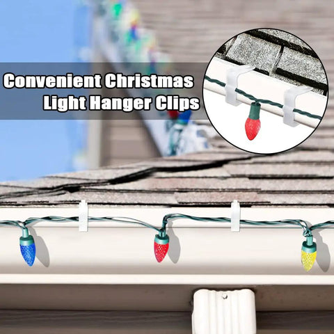 Christmas Light Clips For Fascia Boards Fits One To One And Five Eighths Inch Thickness Roof Gutter Fence Hooks White 100 Pieces Easy Install Outdoor Holiday Decor shown holding lights on roof edge.