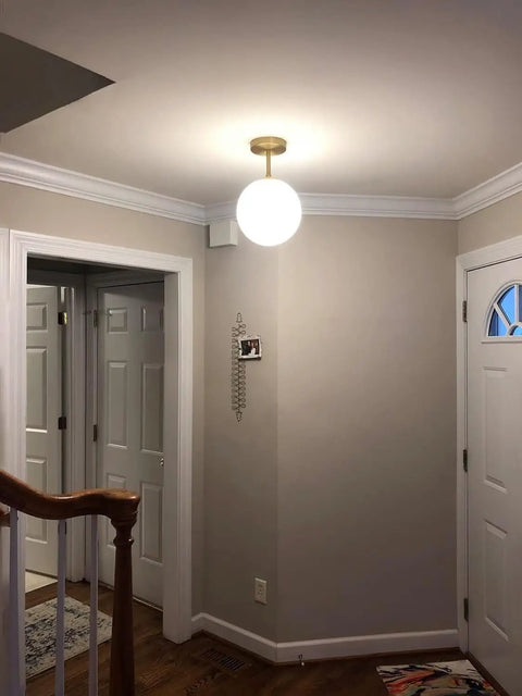 Mid Century Modern Ceiling Light Fixture With Milk Glass Shade And Matte Gold Finish Semi Flush Mount in hallway