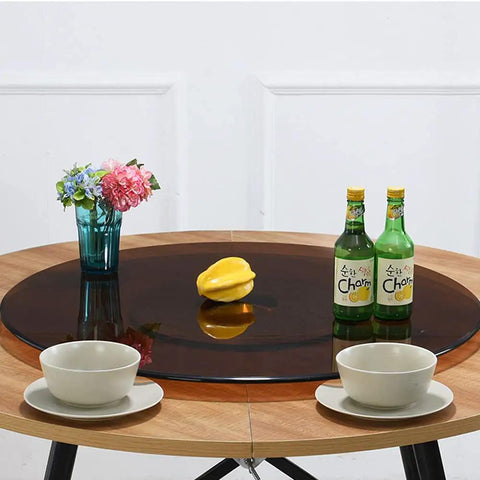 360 Degree Heavy Duty Lazy Susan Turntable For Dining Tables Tempered Glass Swivel Serving Tray on wooden table with dishes.