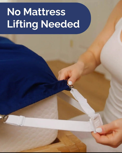 Person attaching adjustable elastic bed sheet holders with strong metal clips, no mattress lifting required, close-up view.