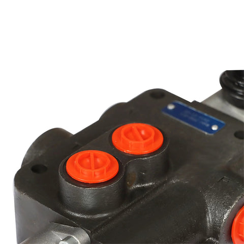 Close-up of single spool hydraulic control valve with red caps, showing durable cast iron construction and precise engineering for heavy-duty use.