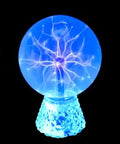 Three colorful plasma balls in red, blue, and green, part of the Extra Large Electric Warming Tray With 3 Temperature Settings set.