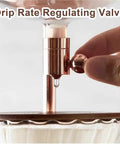 Premium Cold Brew Coffee Maker Featuring Gentle Slow Drip Flow And Adjustable Metal Valves close-up of drip rate regulating valve.