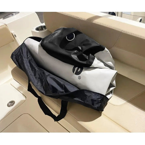 Inflatable Boat Fender For Docking And Raft Ups 42 Inch By 24 Inch Heavy Duty Military Grade Material in carry bag on boat seat.