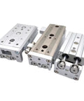 Heavy Duty Mxs8 Pneumatic Slide Table Cylinder Featuring Precision Linear Actuator Mechanics For Smooth Industrial Automation - View of three compact cylinders.