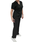 Woman wearing Women's High Waisted Wide Leg Yoga Style Scrub Pants Keeping You Fresh During Nightshifts With Super Comfy Stretch Premium Black Medical Nursing Uniform X Large, showing zippered pockets.