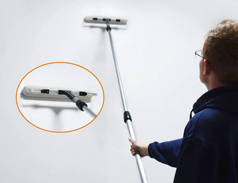 Person using 18 Inch Microfiber Paint Roller Covers Three Eighths Inch Nap Pack Of 3 for smooth wall application.