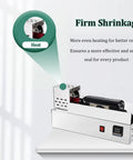600W Neck Heat Shrink Sealing Machine For Wine Bottles, Digital Display, Manual Push Operate, Fast Spiral Heating Element, Heavy Duty Sleeve Shrinker Sealer For Wine And Beverage Labeling Applications with bottle inserted.