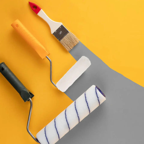 Pro grade mini fleece rollers and brush on yellow background, perfect for smooth wall painting projects.