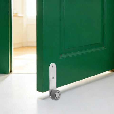 Premium 6 Pack Silver Sliding Door Roller Casters With Reinforced Steel Core And TPE Wheels Includes Anti Sagging Floor Guide For Barn Doors That Glide Damn Smooth Every Time close-up of roller caster attached to green barn door.