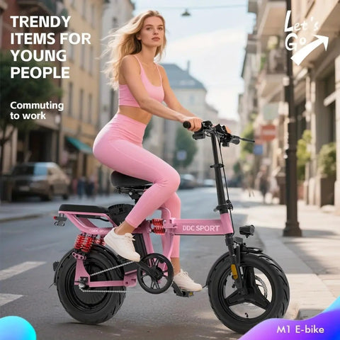 Young woman riding Folding Electric Bike For Adults With 800W Peak Motor Up To 20 MPH, Removable 48V 14Ah Battery in city.