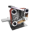 Ultra Compact Mini Electric Belt Sander With 4 Axis Variable Speed detailed view showing metallic structure and sanding belt setup.