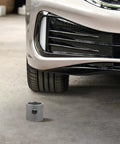 Swivel Mount Trailer Jack for Camper Welding next to car wheel emphasizing size and durability, heavy duty pipe bracket shown