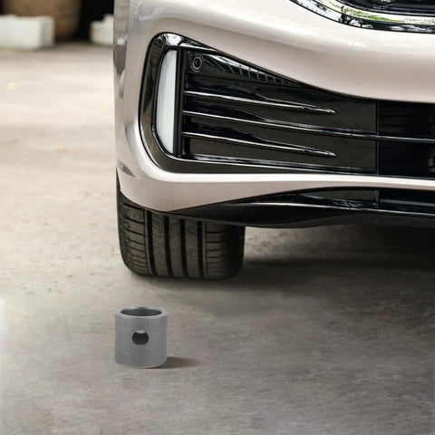 Swivel Mount Trailer Jack for Camper Welding next to car wheel emphasizing size and durability, heavy duty pipe bracket shown
